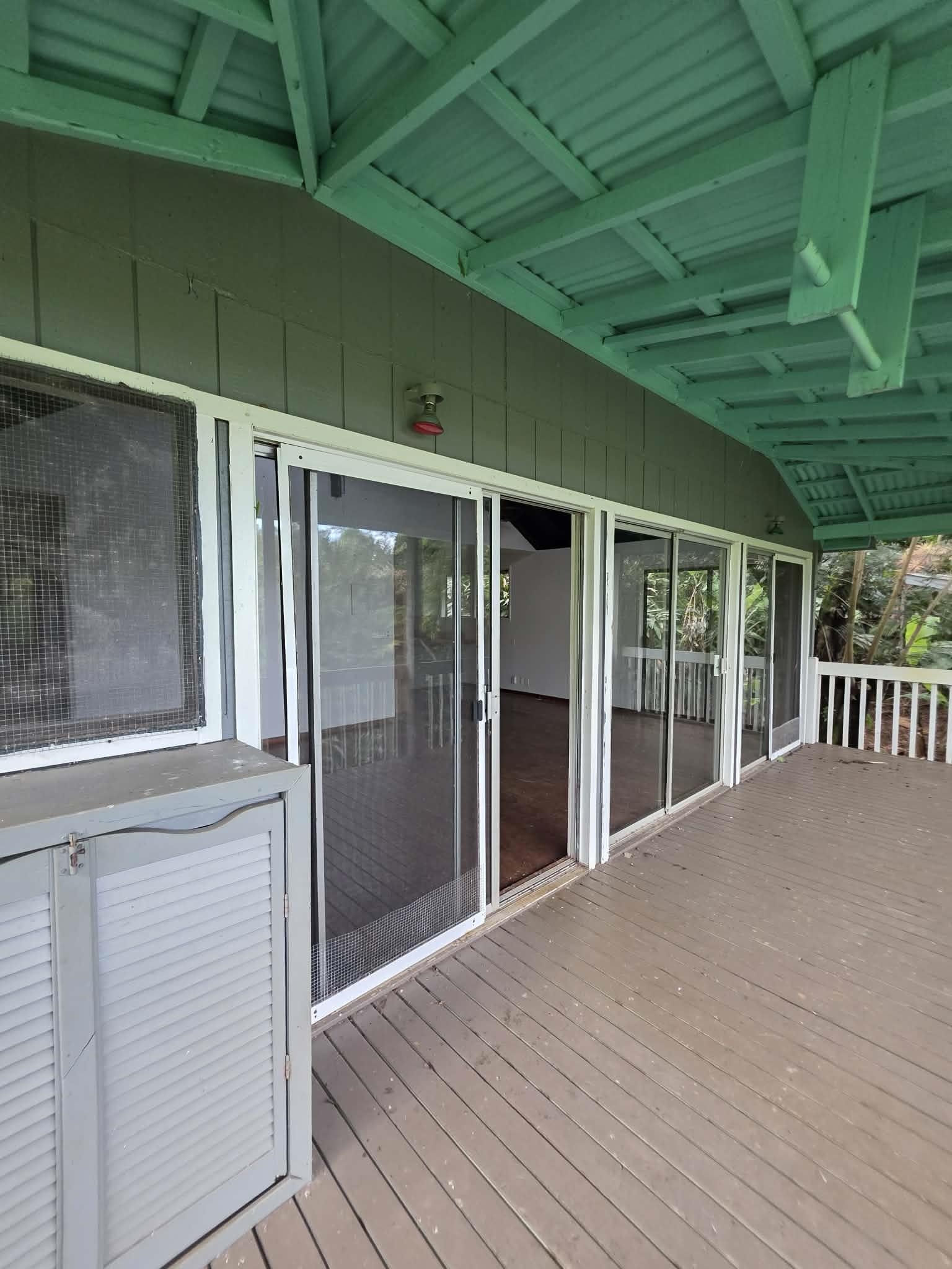420 Haumana Road Haiku, HI 96708 - Photo 9 of 31 a view of a house with a deck