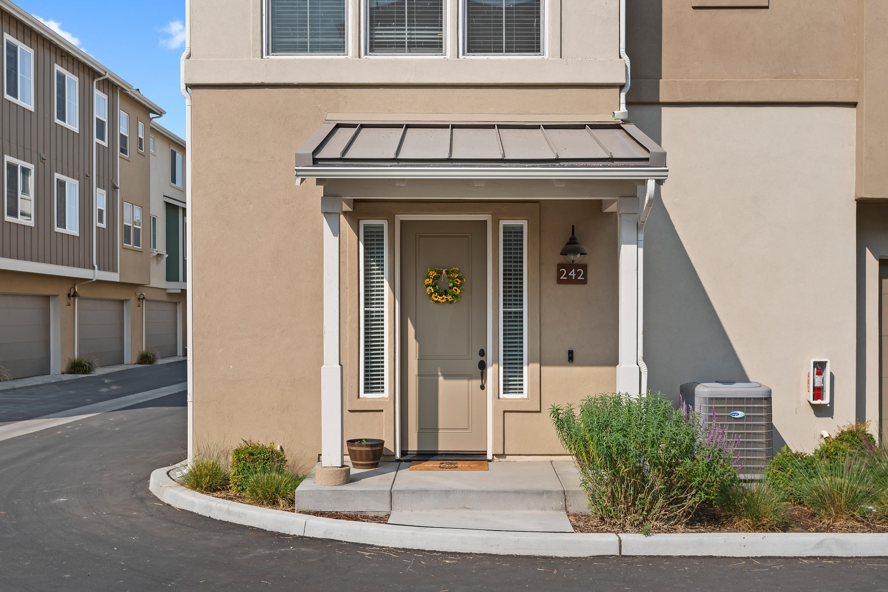 242 Robles Way Buellton, CA 93427 - Photo 1 of 25 a front view of a house with a yard