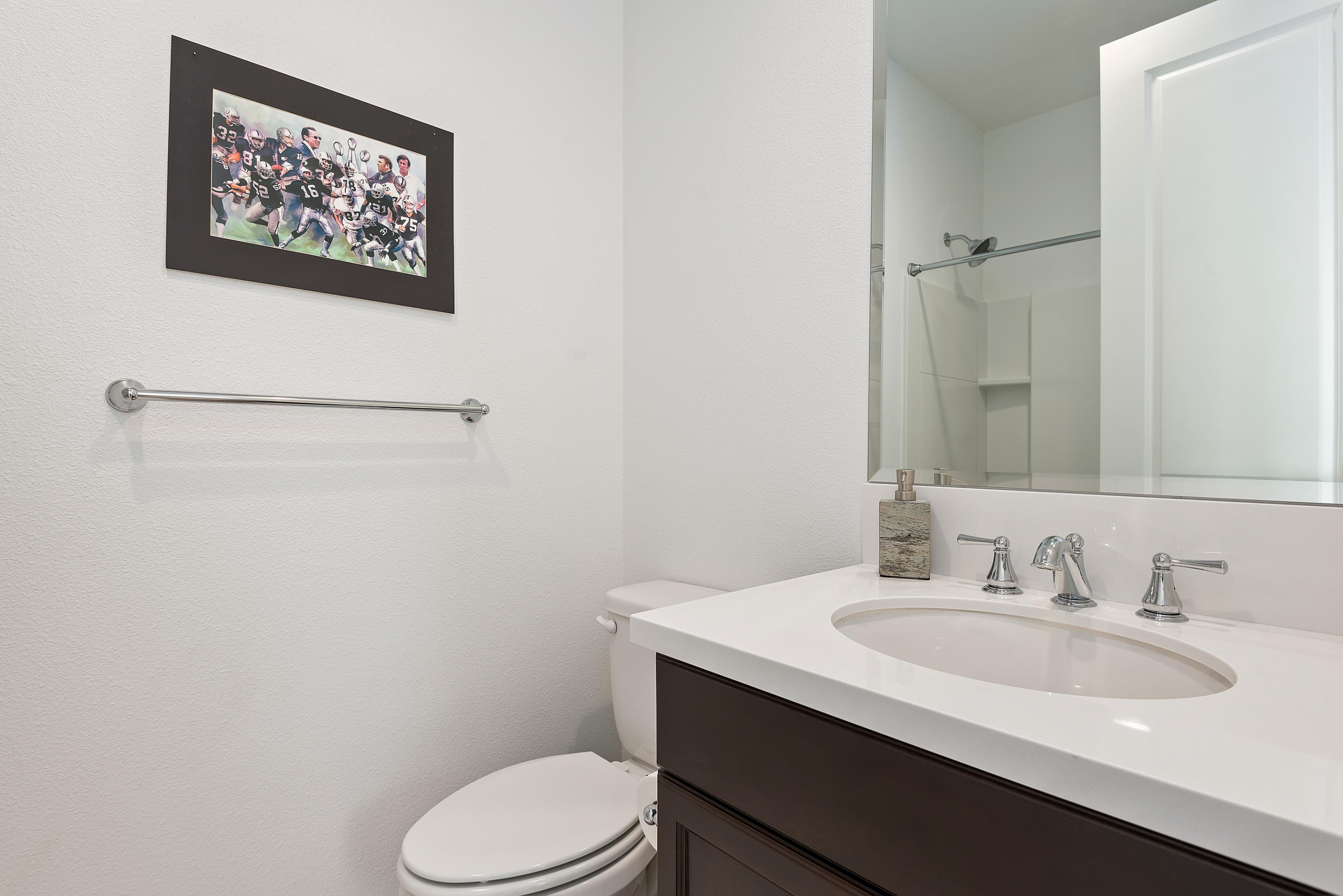 242 Robles Way Buellton, CA 93427 - Photo 15 of 25 a bathroom with a toilet sink and mirror