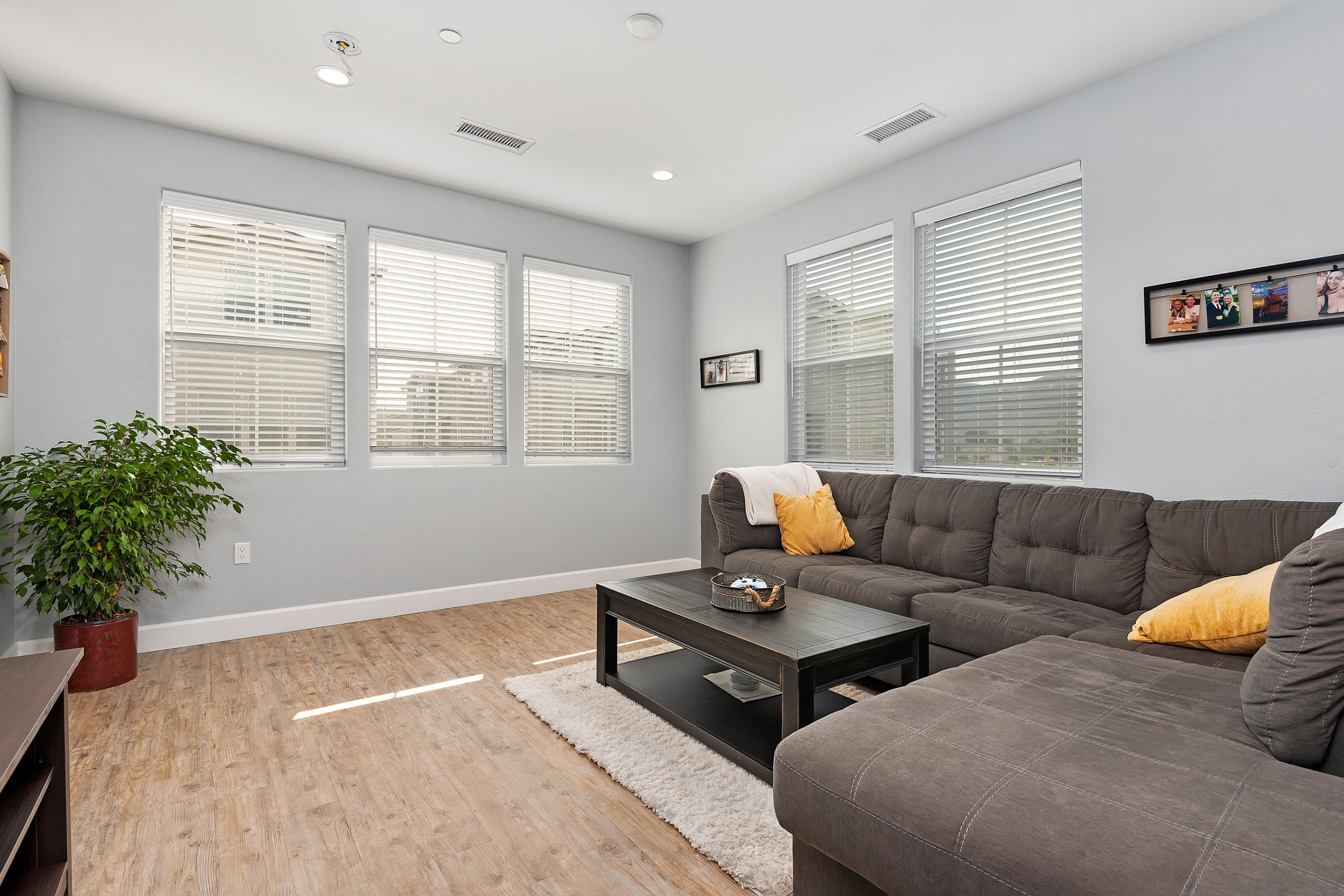242 Robles Way Buellton, CA 93427 - Photo 9 of 25 a living room with furniture and a potted plant