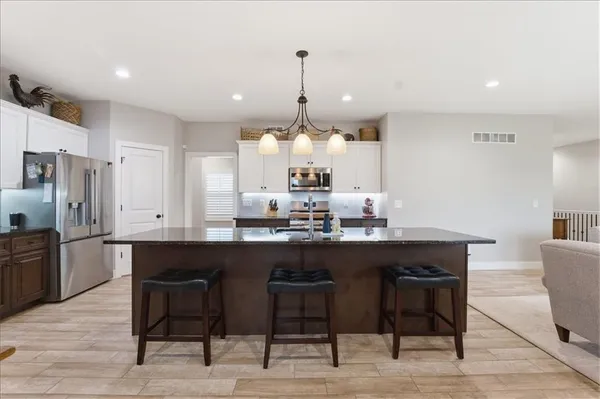 $449,900 | 720 Gamma Grass Place, Raymore, MO 64083