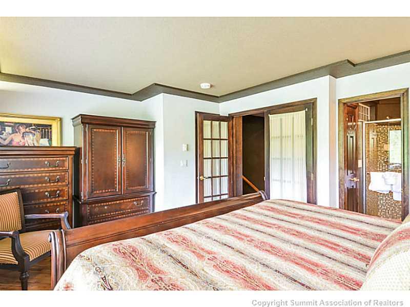 1944 Soda Ridge Road, Unit 1229 Keystone, CO 80435 - Photo 11 of 17 a bedroom with a bed and a dresser next to a window