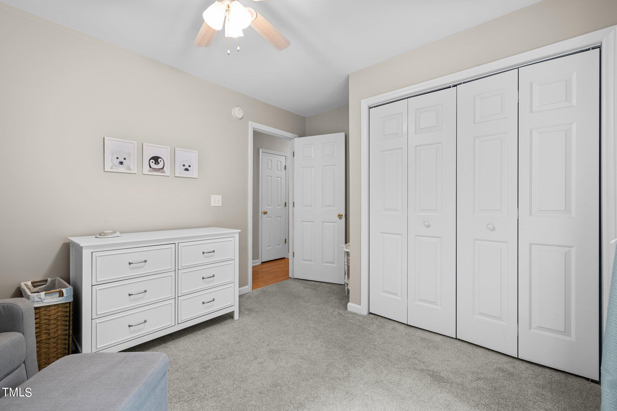 7031 Calais Drive Durham, NC 27712 - Photo 23 of 48 a view of an empty room with a cabinet