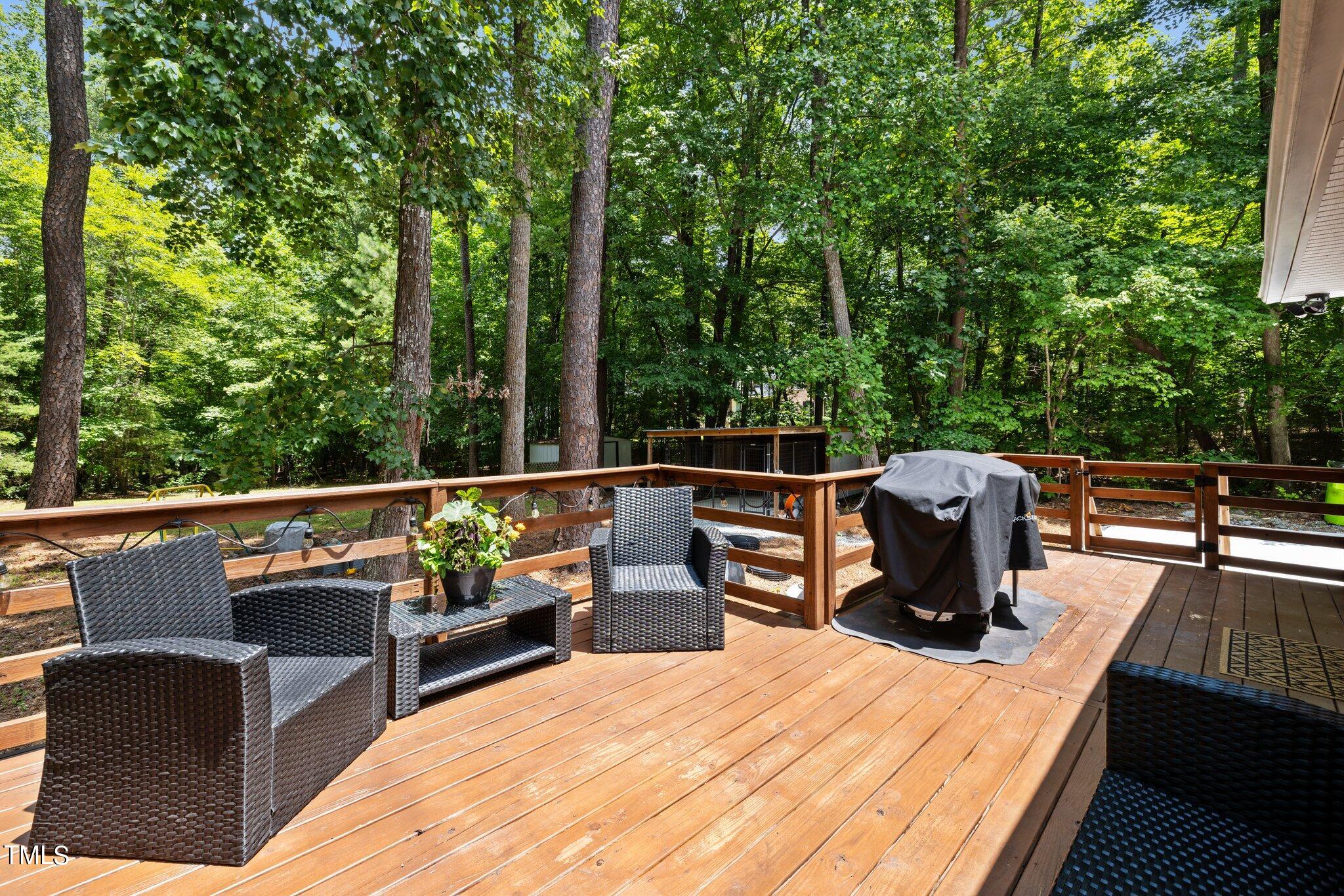 7031 Calais Drive Durham, NC 27712 - Photo 28 of 48 a view of a roof deck with couches