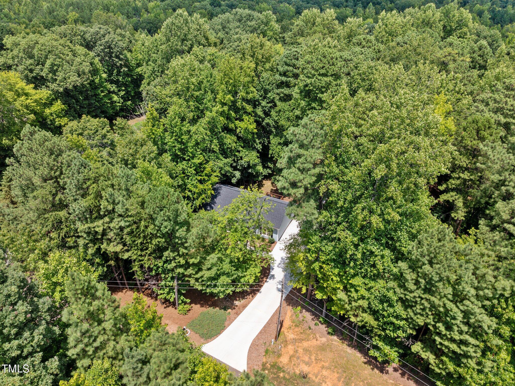 7031 Calais Drive Durham, NC 27712 - Photo 45 of 48 a view of a garden