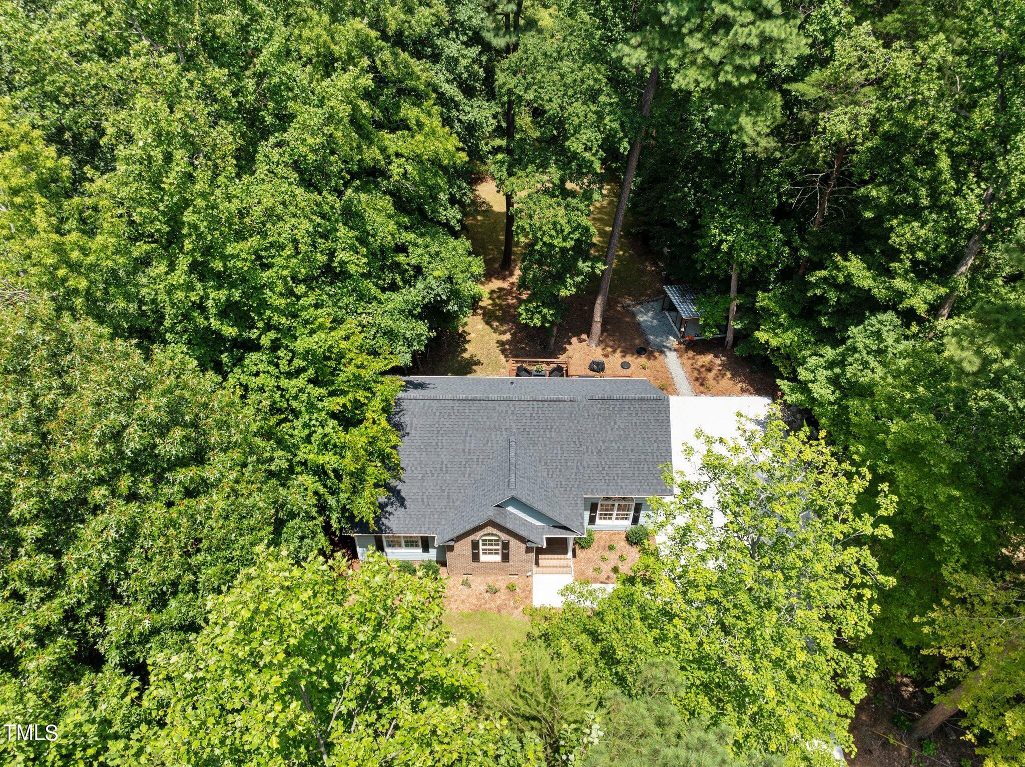7031 Calais Drive Durham, NC 27712 - Photo 46 of 48 view of a house with a yard