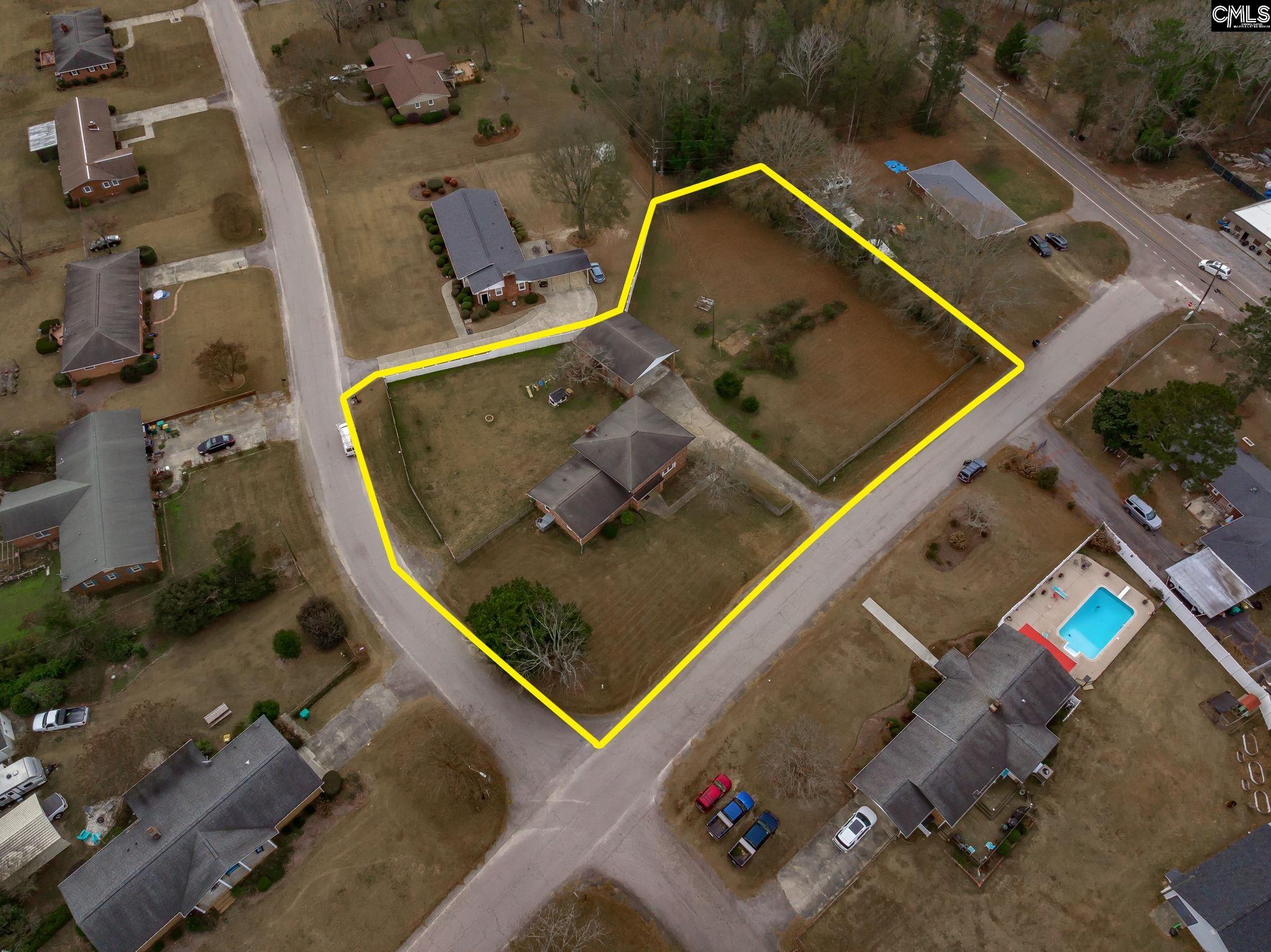 560 Edisto Street Batesburg, SC 29006 - Photo 3 of 49 an aerial view of a house with a swimming pool