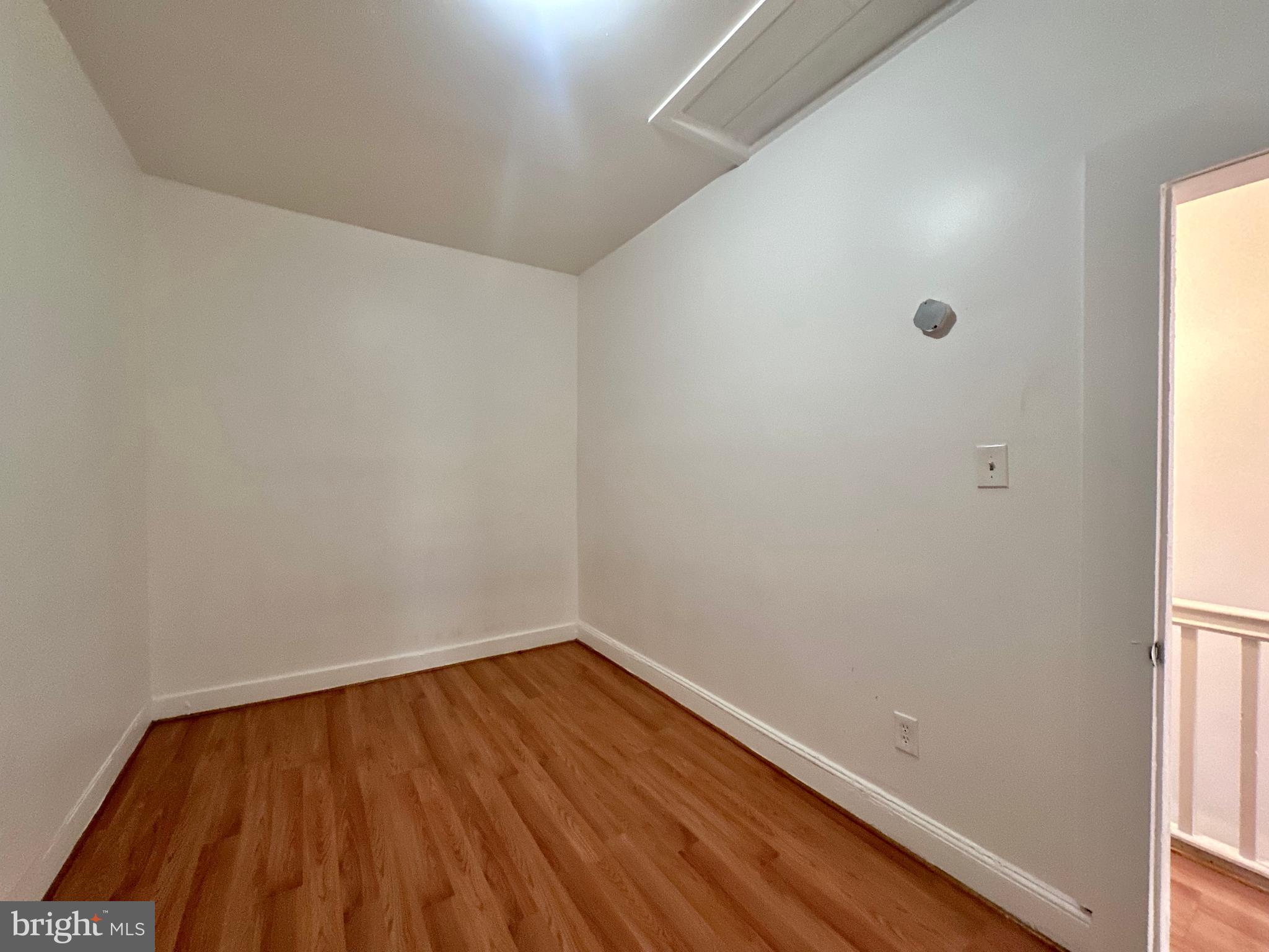 2770 The Alameda Baltimore, MD 21218 - Photo 19 of 33 a view of room with wooden floor and fan