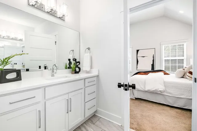 a bedroom with a bed and a cabinets