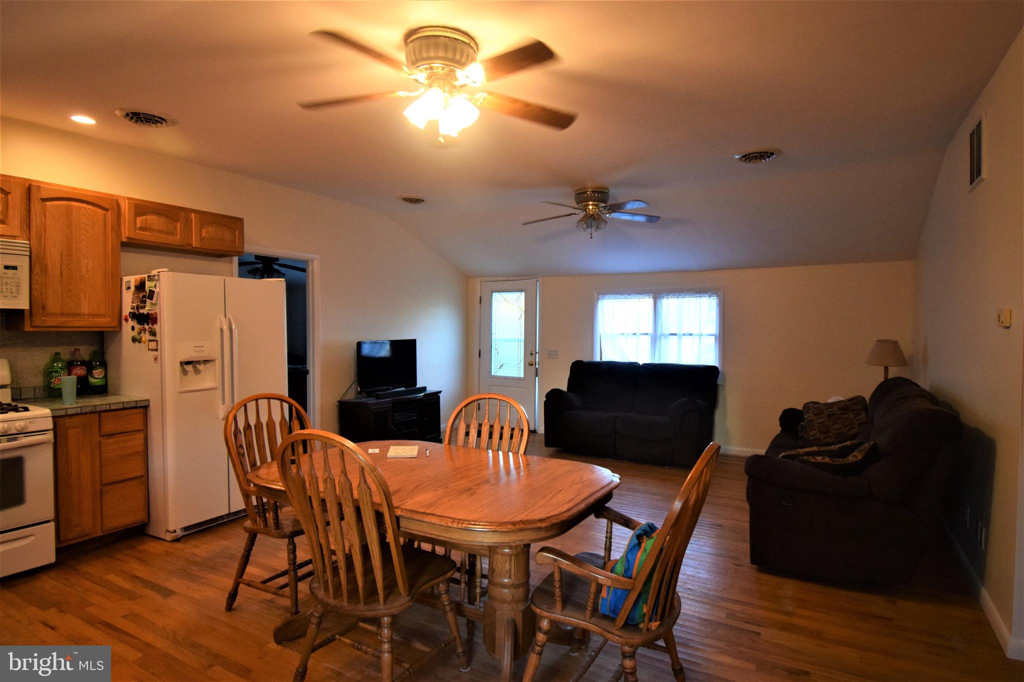 15500 Cutoff Road Henderson, MD 21640 - Photo 5 of 29 Enter into the open living / kitchen space.