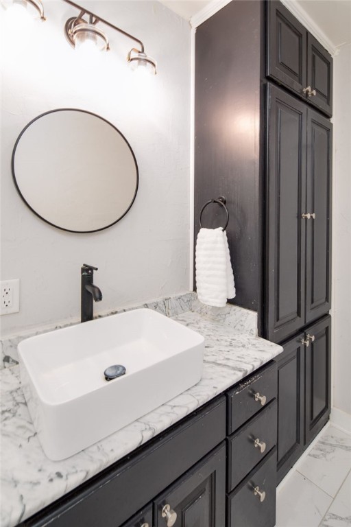 833 Enfield Street Bryan, TX 77802 - Photo 25 of 33 a bathroom with a sink and a mirror