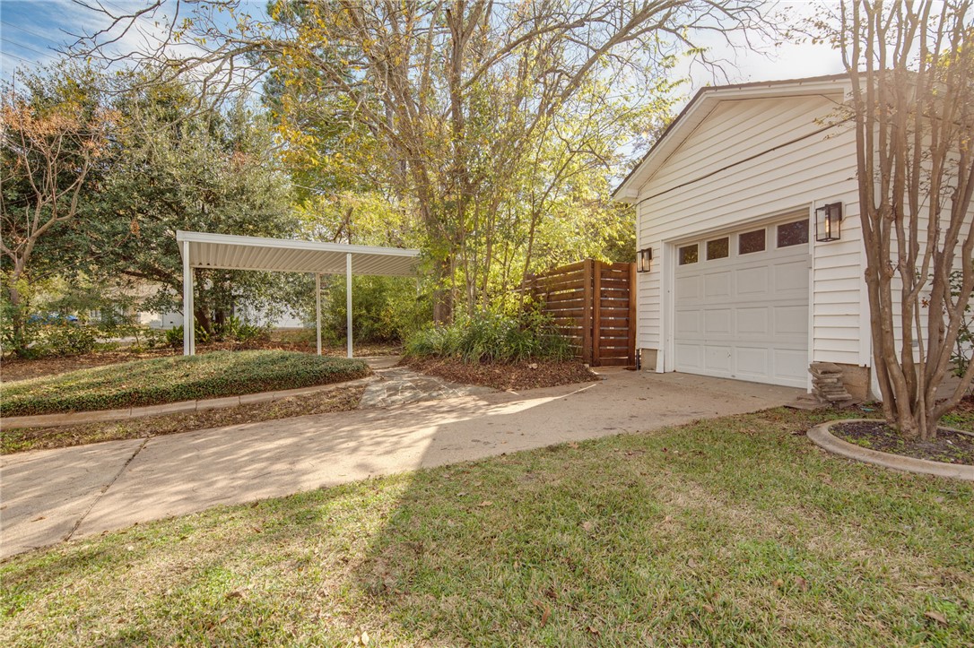 833 Enfield Street Bryan, TX 77802 - Photo 30 of 33 a view of a house with backyard and trees