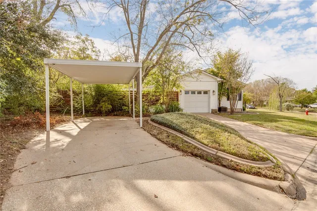 a view of a building with a yard
