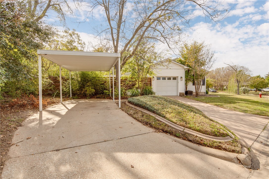 833 Enfield Street Bryan, TX 77802 - Photo 31 of 33 a view of a building with a yard