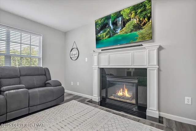 a view of a dining table and chairs in a room