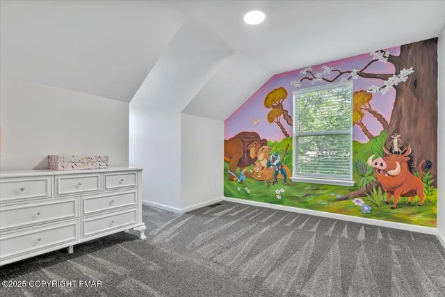 an aerial view of residential house with outdoor space and street view