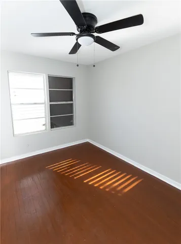 an empty room with window