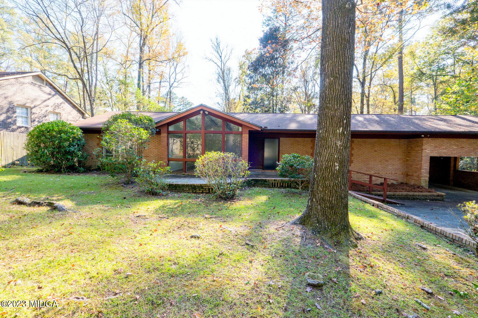 a view of swimming pool with a backyard