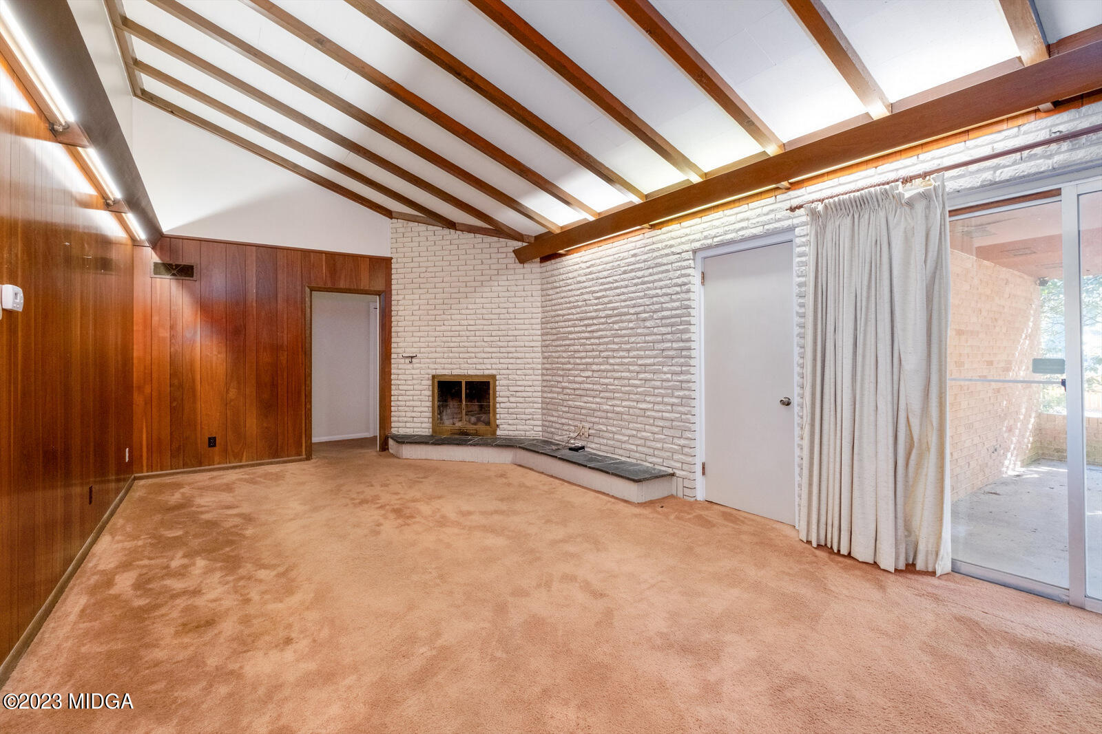 1460 Lone Oak Road Macon, GA 31211 - Photo 12 of 34 a view of an empty room with a fireplace