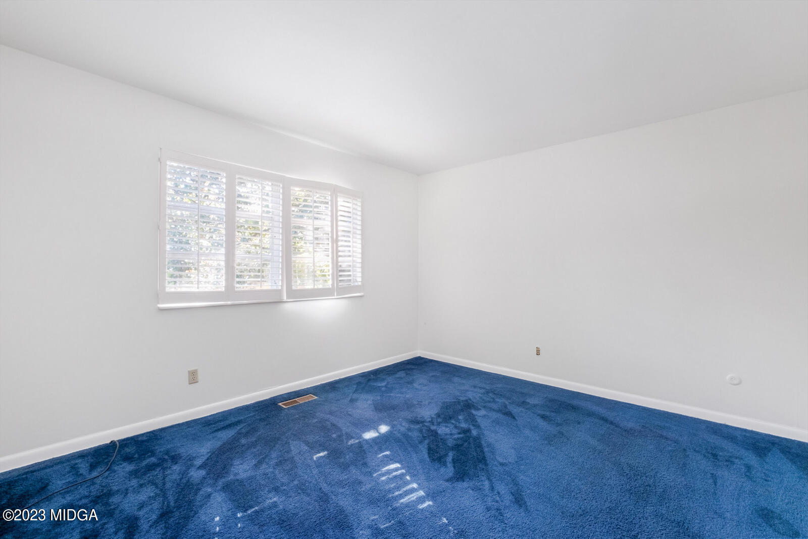 1460 Lone Oak Road Macon, GA 31211 - Photo 21 of 34 an empty room with a window