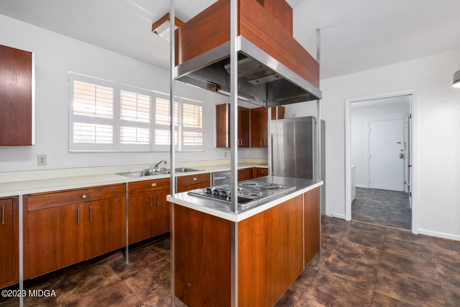 1460 Lone Oak Road Macon, GA 31211 - Photo 3 of 34 a kitchen with stainless steel appliances granite countertop a sink stove and refrigerator