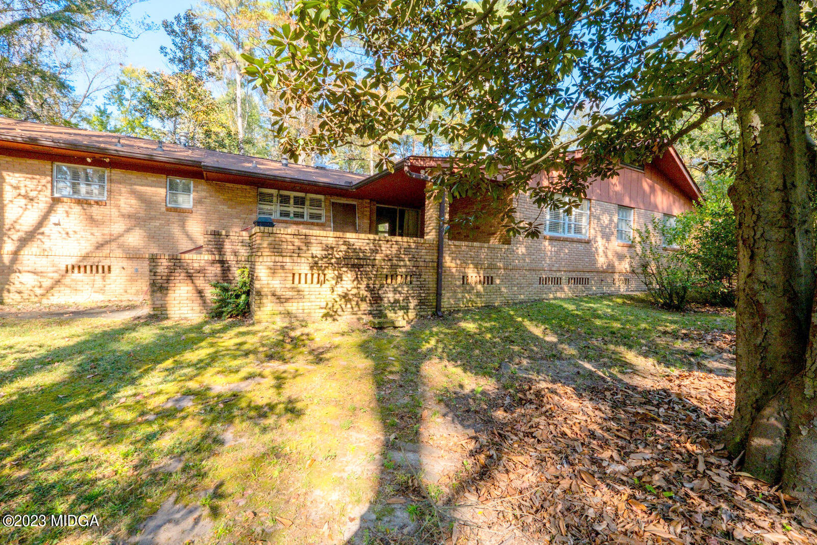 1460 Lone Oak Road Macon, GA 31211 - Photo 34 of 34 a front view of a house with a yard