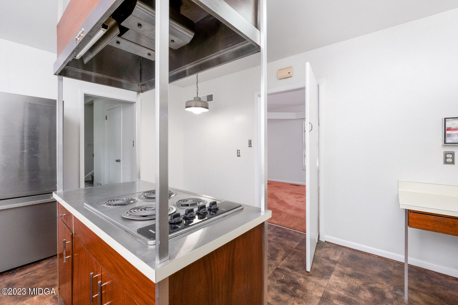 1460 Lone Oak Road Macon, GA 31211 - Photo 4 of 34 a kitchen with stainless steel appliances granite countertop a stove and a refrigerator