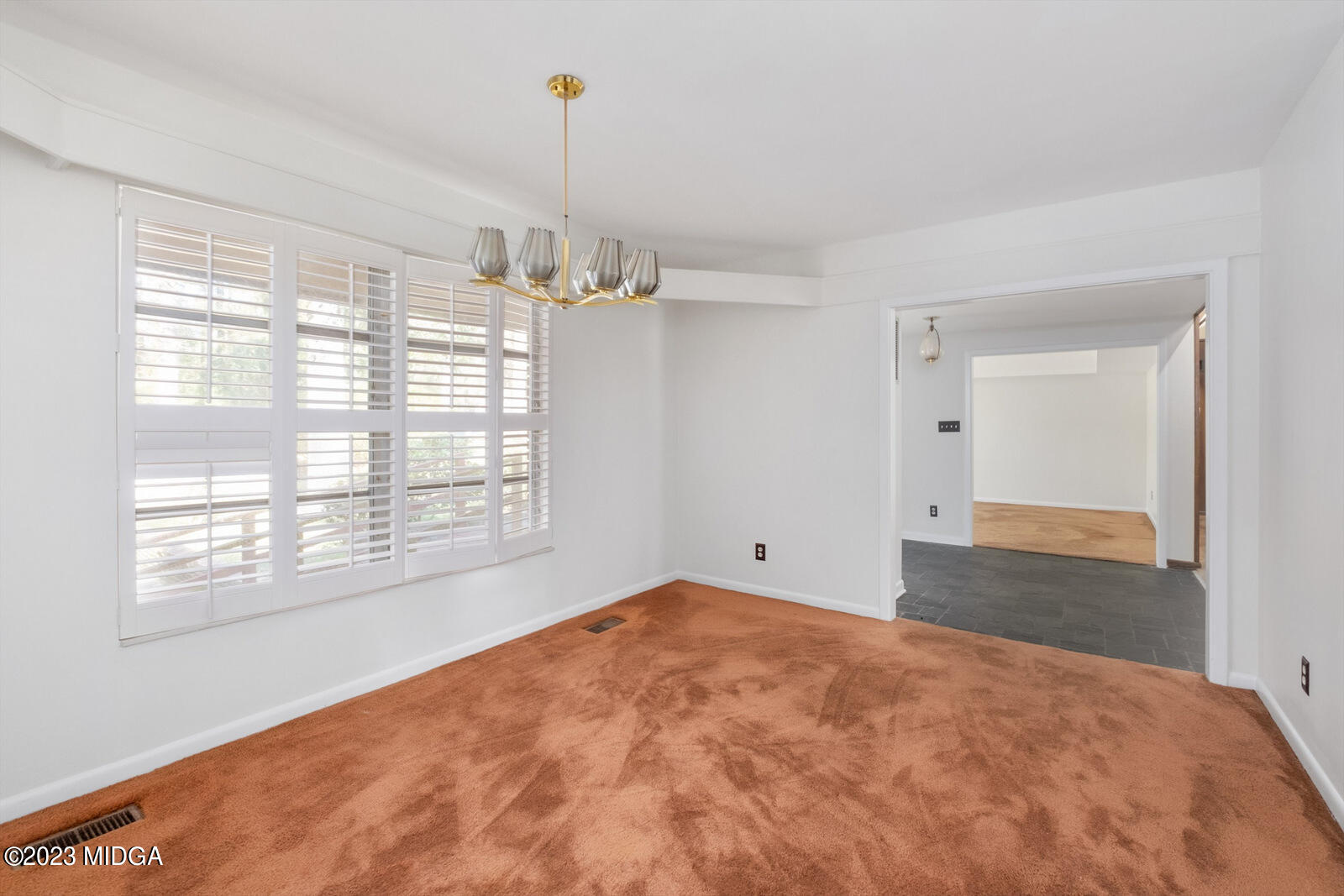 1460 Lone Oak Road Macon, GA 31211 - Photo 6 of 34 a view of an empty room with a window