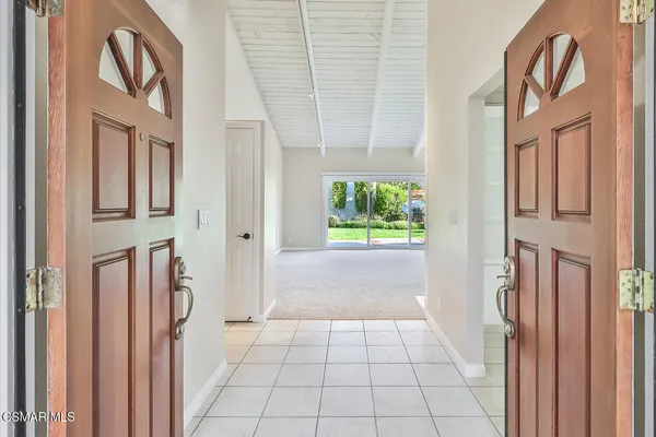 a view of an entryway with a fireplace