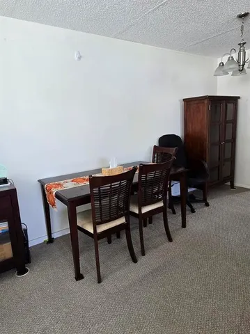 a view of a workspace with furniture