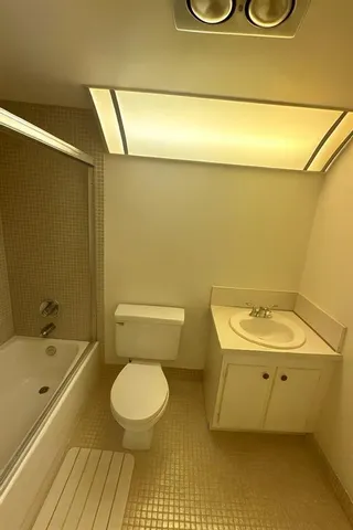 a bathroom with a sink and a toilet