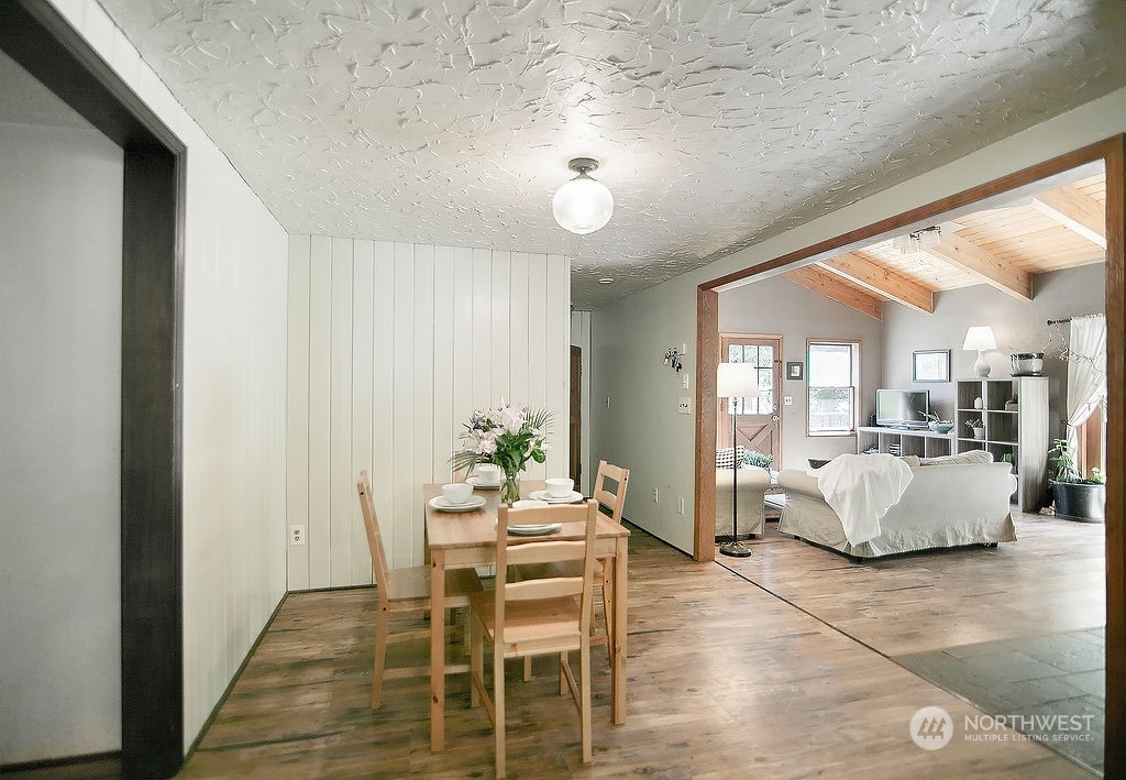 2038 Abernathy Creek Road Longview, WA 98632 - Photo 11 of 37 a dining room with furniture and wooden floor