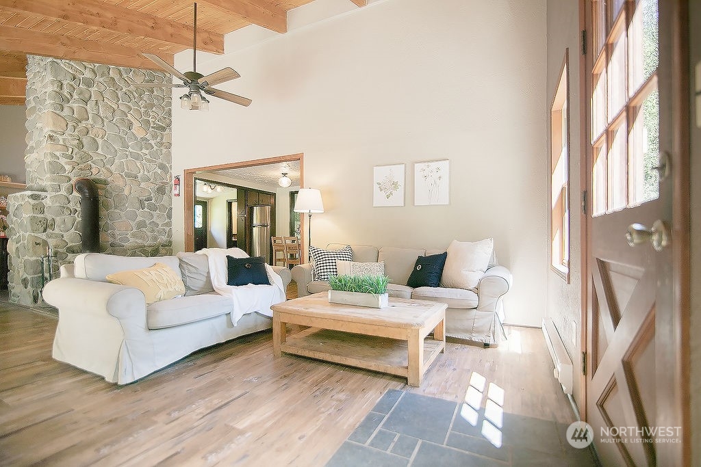 2038 Abernathy Creek Road Longview, WA 98632 - Photo 2 of 37 a living room with furniture and a fireplace