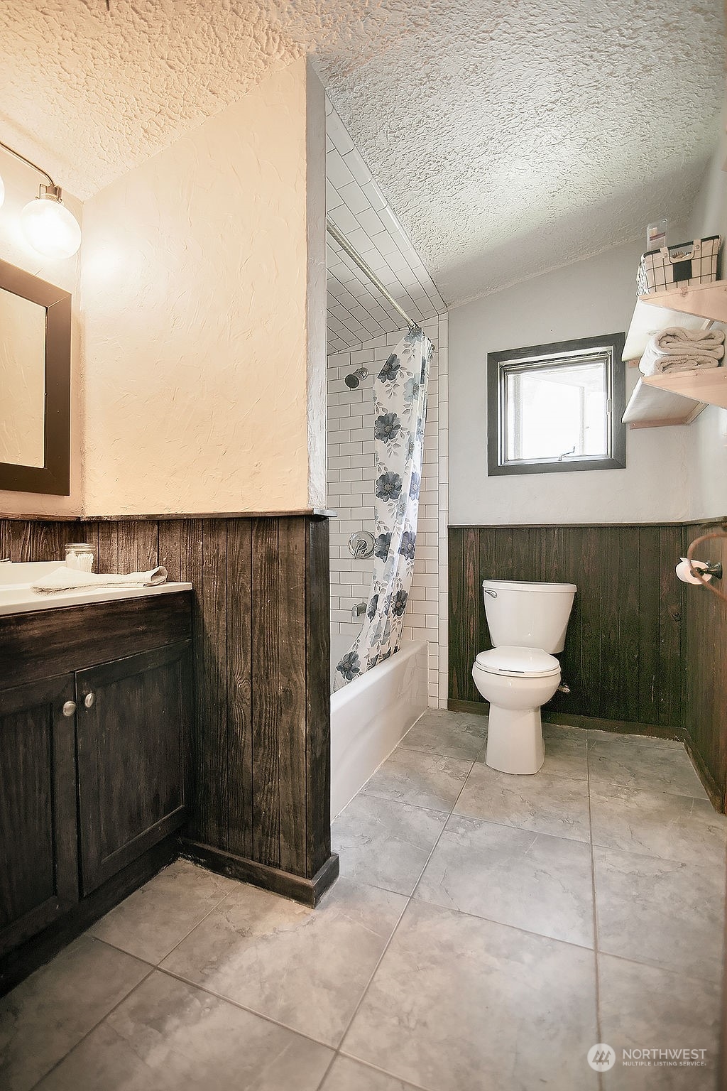 2038 Abernathy Creek Road Longview, WA 98632 - Photo 23 of 37 a bathroom with a sink a toilet and a shower