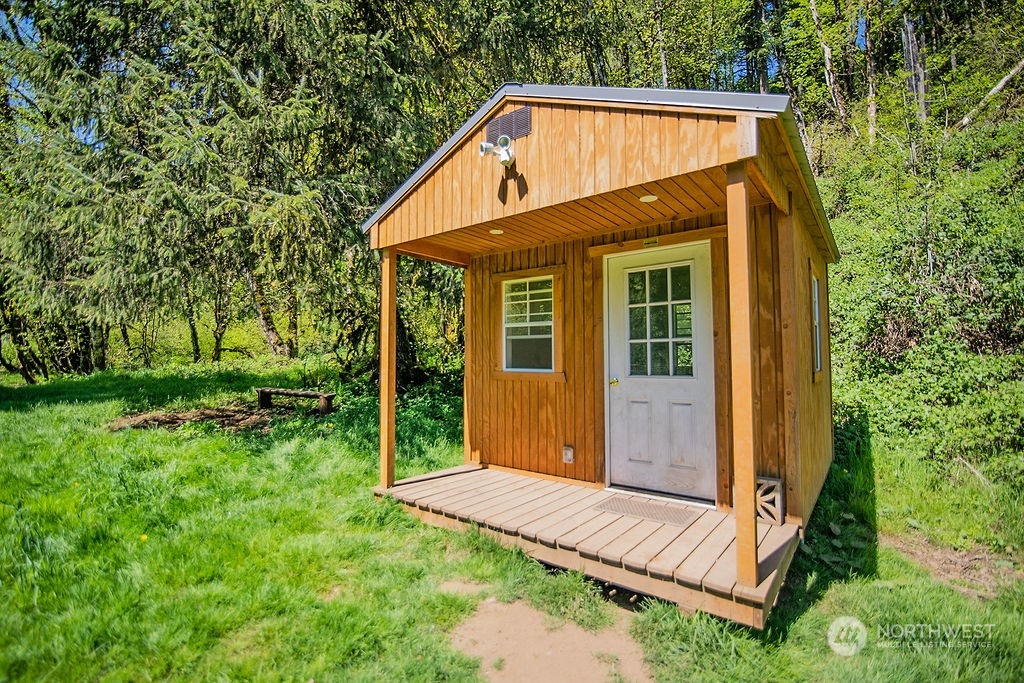 2038 Abernathy Creek Road Longview, WA 98632 - Photo 26 of 37 a view of house with backyard