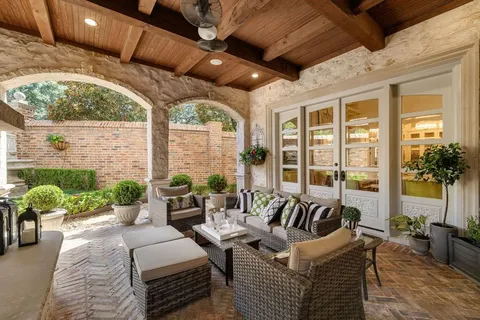 a outdoor living space with furniture and garden view