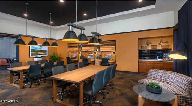 a view of a dining room with furniture