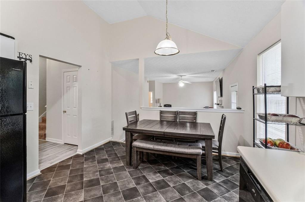 675 Michael Circle Monroe, GA 30655 - Photo 15 of 34 a room with furniture a rug and kitchen view