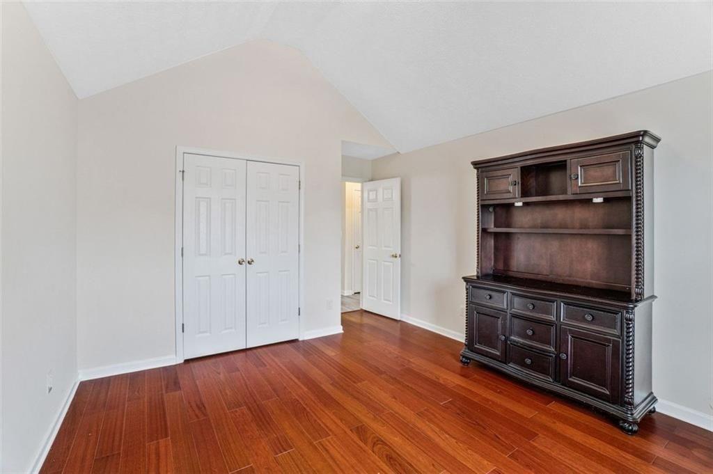 675 Michael Circle Monroe, GA 30655 - Photo 29 of 34 a view of empty room with wooden floor and cabinet