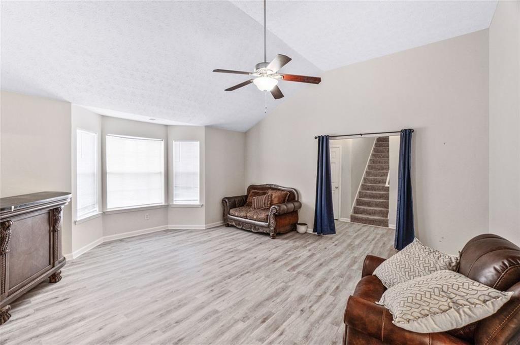 675 Michael Circle Monroe, GA 30655 - Photo 8 of 34 a living room with furniture and a window