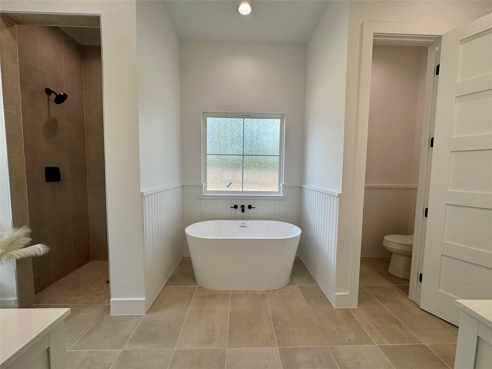 1353 Red Town Road, Unit B Elgin, TX 78621 - Photo 14 of 26 a living room with a sink and a toilet