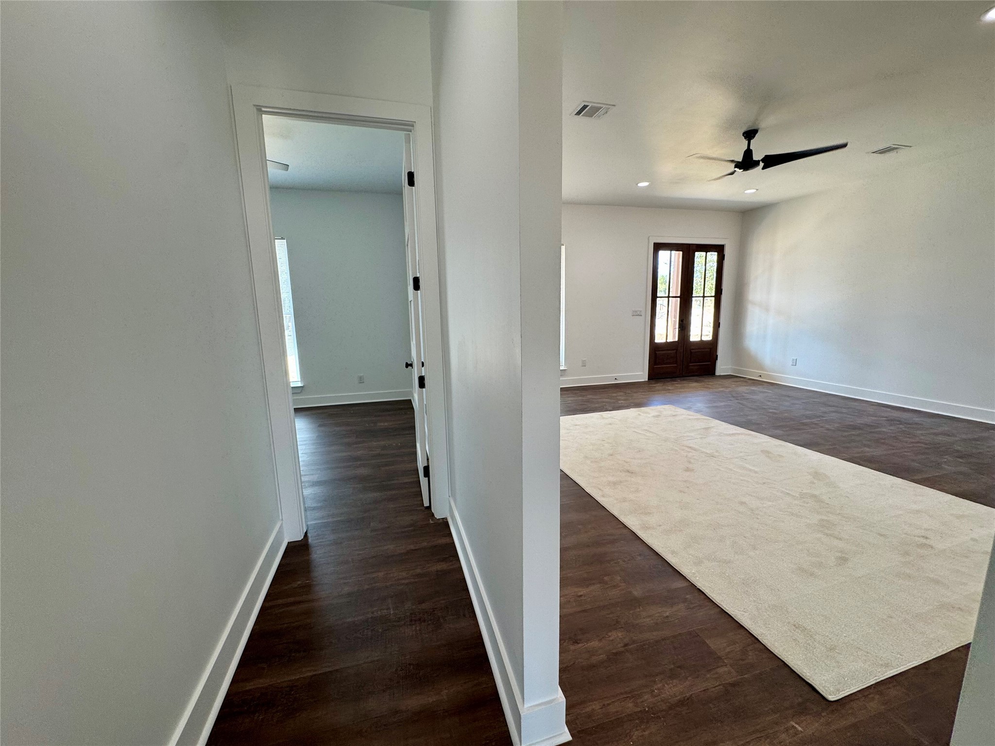 1353 Red Town Road, Unit B Elgin, TX 78621 - Photo 22 of 26 wooden floor in a hall with an entryway