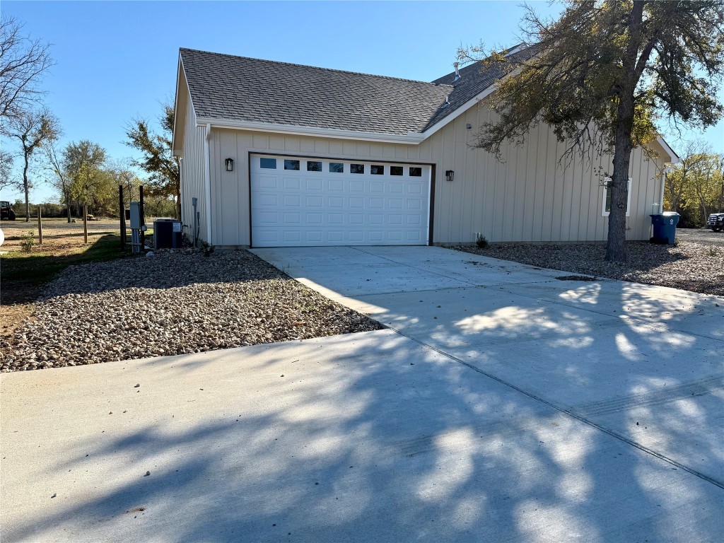 1353 Red Town Road, Unit B Elgin, TX 78621 - Photo 5 of 26 a view of a backyard of a house