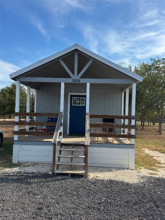 1353 Red Town Road, Unit B Elgin, TX 78621 - Photo 6 of 26 a front view of house with outdoor seating