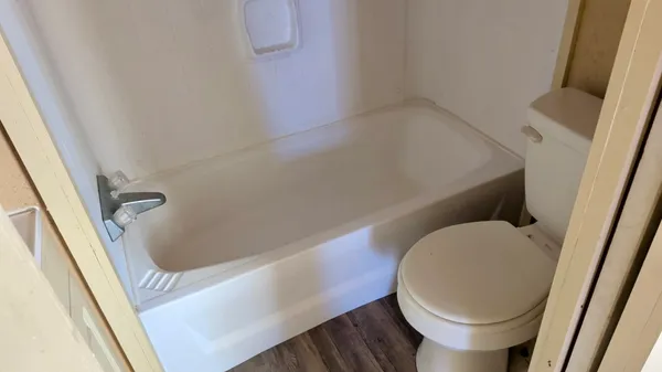 a bathroom with a toilet and a sink