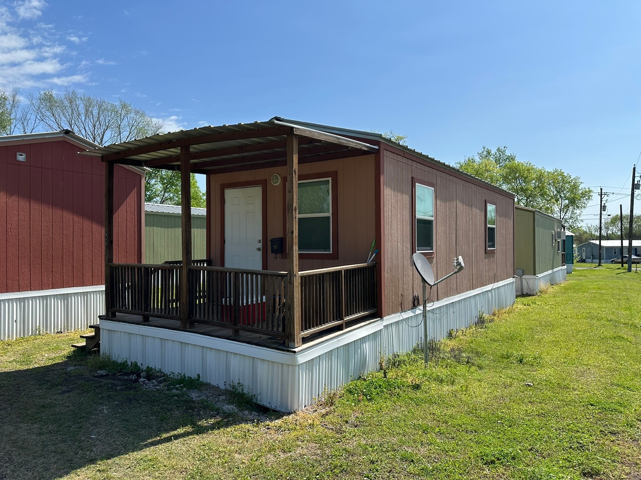 401 North Clegg Street Trinity, TX 75862 - Photo 2 of 15 a view of house with backyard and entertaining space