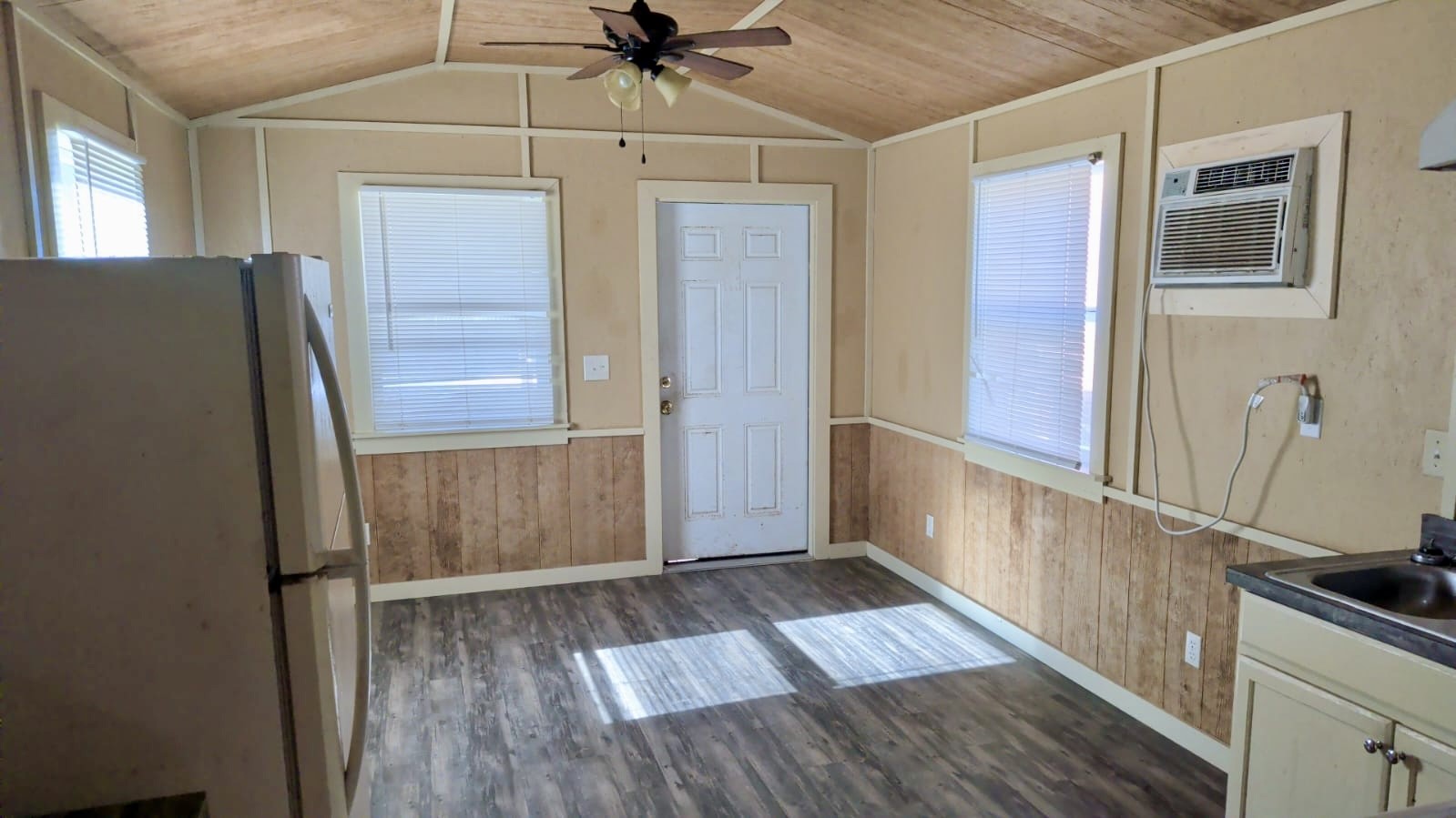401 North Clegg Street Trinity, TX 75862 - Photo 5 of 15 a view of a hallway with wooden floor and staircase