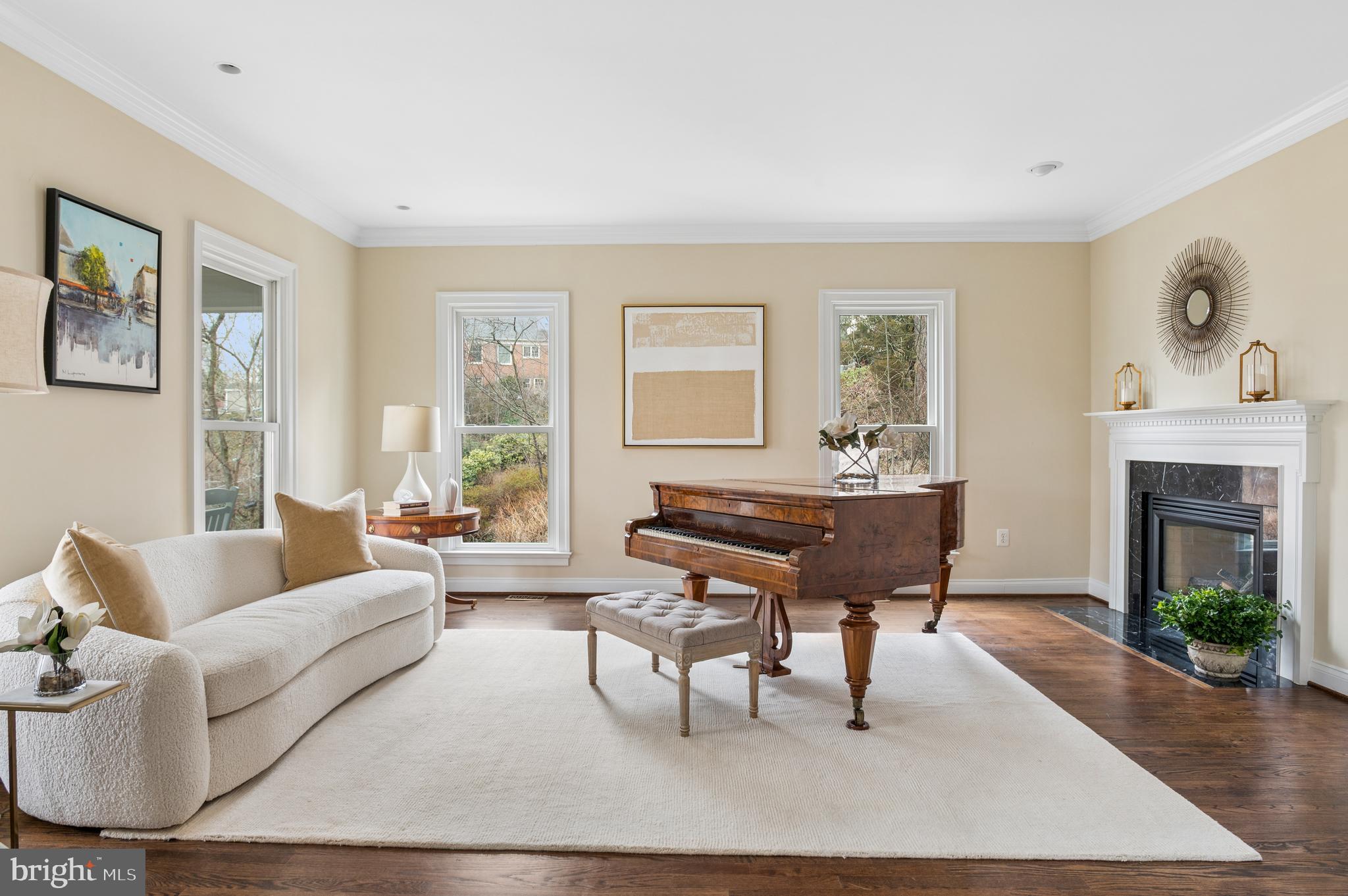 5400 Mohican Road Bethesda, MD 20816 - Photo 14 of 47 a living room with furniture a fireplace and a window