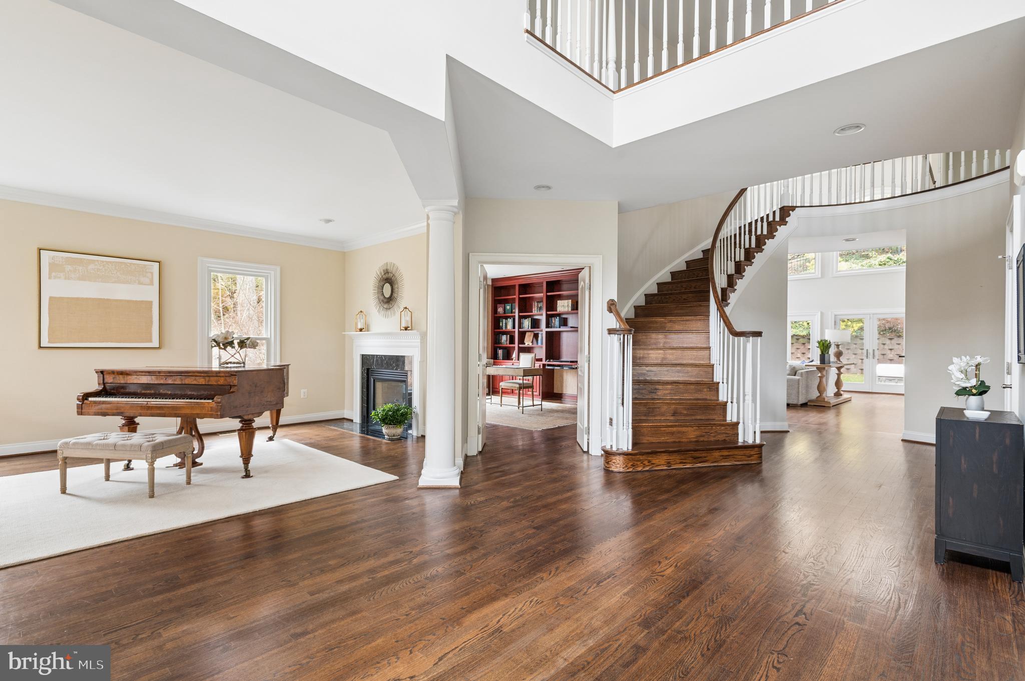 5400 Mohican Road Bethesda, MD 20816 - Photo 22 of 47 a living room with fireplace furniture and a wooden floor
