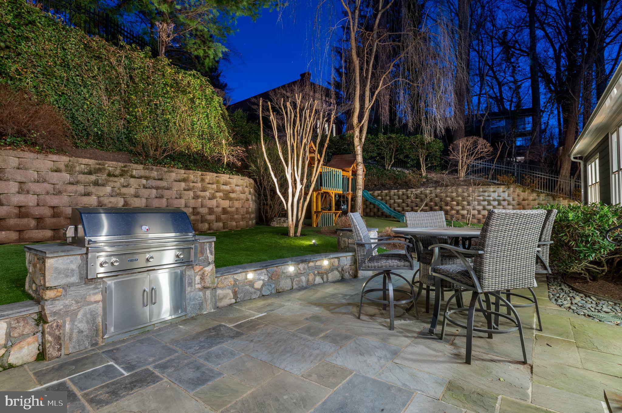 5400 Mohican Road Bethesda, MD 20816 - Photo 40 of 47 a view of a patio with table and chairs and potted plants